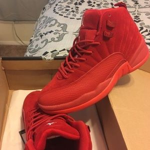 Red suede Jordan 12s size 7 in MEN